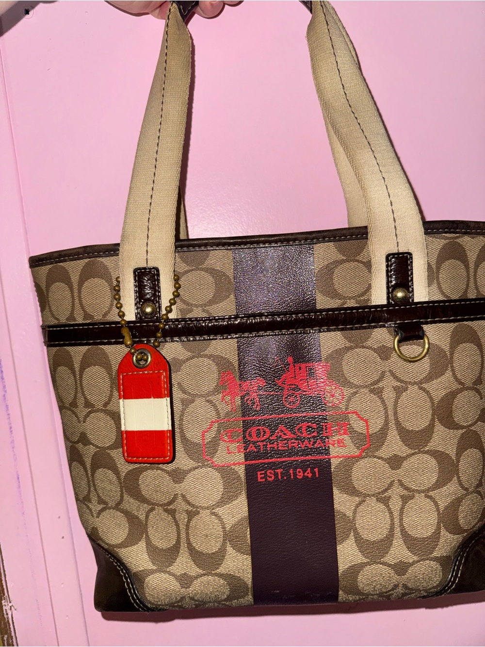 Coach Tan Signature Canvas Tote with Brown Trim and Red Accent